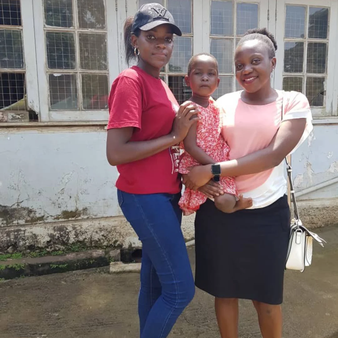 Phoebe and Edith holding Abigail